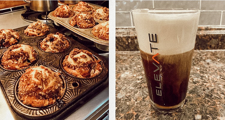 Two pans of freshly baked muffins and a glass of cold foam cold brew coffee